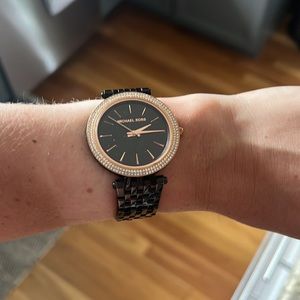 Michael kors black watch with gold accent and diamonds